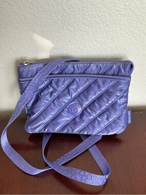Kipling ‘Emily in Paris’ RIRI Lavender Quilted Nylon Crossbody Bag